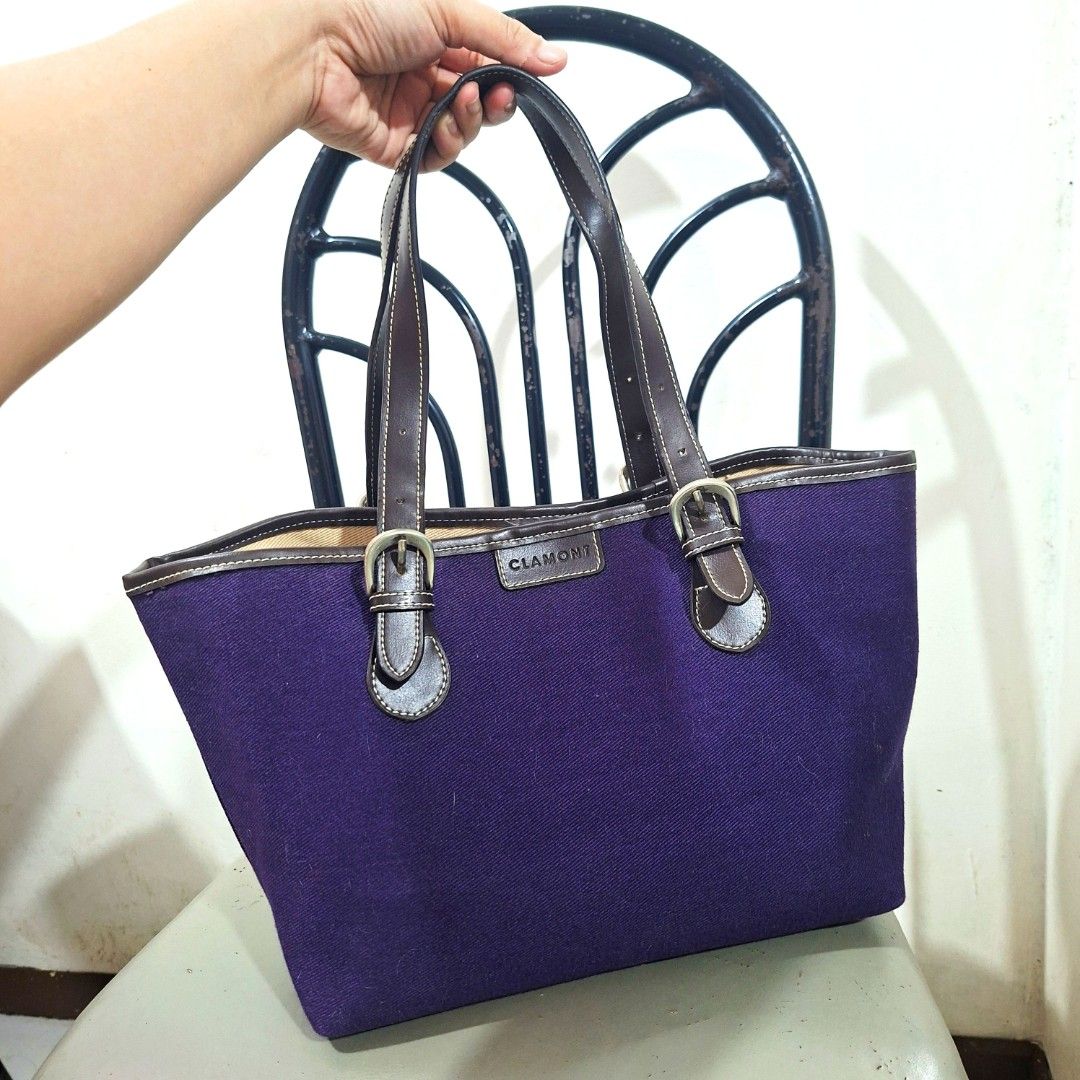 Clamont Purple Canvas Medium Tote Bag (Category: Tote Bags) located in Cagayan de Oro. Submitted by langscloset (Listing ID 1459727839, Image 3). Description: medium size tote bag. brand is Clamont. adjustable strap handle. bigay ng tita ko from Japan. like new no issue. add P85 lng for sf :).
