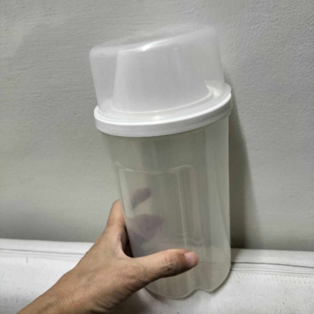 Clear Plastic Storage Container with Lid (Category: Storage Boxes & Baskets) located in Paranaque City. Submitted by decluttering-all (Listing ID 1459691907, Image 3). Description: - Clear plastic storage container - Features measurement markings up to 150ml - Snug-fitting clear lid - Perfect for storing grains, dry goods or small food items - Easy to see contents - Stackable design p150 only recently bought, seldom used, good condition declutter