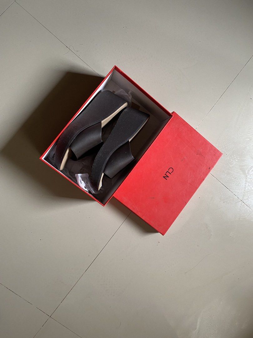 CLN Brown Wedge Sandals Size 40 (Category: Flats & Sandals) located in Cabanatuan. Submitted by ashramtobi29604 (Listing ID 1459703135, Image 1). Description: - Brand: CLN - Color: Brown - Style: Wedge Sandals - Size: 40 - Type: Slip-on - Sole: Textured pattern - Includes: Original box - Ideal for: Casual wear Seldom used maalikabok lng lp posted.