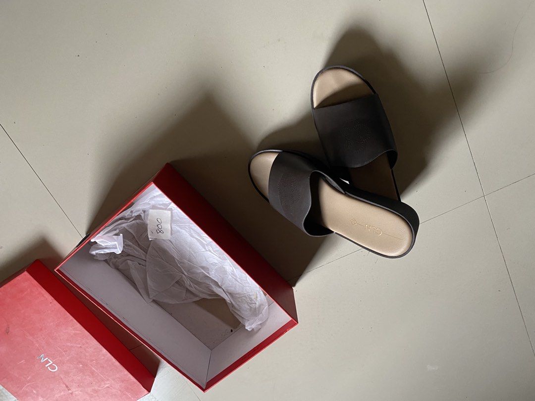 CLN Brown Wedge Sandals Size 40 (Category: Flats & Sandals) located in Cabanatuan. Submitted by ashramtobi29604 (Listing ID 1459703135, Image 3). Description: - Brand: CLN - Color: Brown - Style: Wedge Sandals - Size: 40 - Type: Slip-on - Sole: Textured pattern - Includes: Original box - Ideal for: Casual wear Seldom used maalikabok lng lp posted.