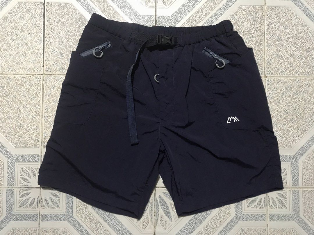 CMF Outdoor Garment Kiltic Comfy Multi Pocket Gorpcore Short (Category: Shorts) located in Manila. Submitted by blackdmnd_stuff (Listing ID 1459780035, Image 3). Description: Authentic/legit GoodasNew Condition No damage/issue Features: CMF OUTDOOR GARMENT is a Japanese label reworking outdoor clothing through modular utility and experimental construction. Layered pockets, adaptable pattern systems and technical materials give familiar garments a