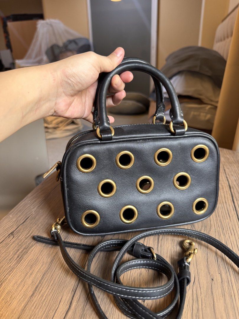 Coach Crossbody Bag (Category: Cross-body Bags) located in Bacolod City. Submitted by SOLunaStellar (Listing ID 1459716482, Image 3). Description: Bought in Gotemba, Japan in 2025. With receipt and dust-bag. Small. Seldom used, like ne. SRP around 16,000php Bought it at 50% Off for 8,000php. I still have the receipt 😊 Negotiable for sure buyers. RFS: Pregnancy Fund 💕.