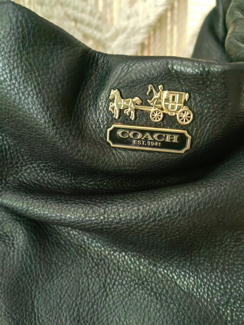Coach Black Leather Hobo Shoulder Bag (Category: Luxury Bags & Wallets) located in Davao. Submitted by gelleevanelli (Listing ID 1459724383, Image 3). Description: *Coach Phoebe 21762 in Black - Large Hobo Shoulder Bag.* *1. Model & Identification:* - *Model:* Coach Madison Phoebe No. 21762 / F21762 - *Creed Patch:* Inside patch reads "THIS IS A COACH BAG..." and serial *No. A1330-21762* - this confirms it's an authentic Madison Phoebe collection