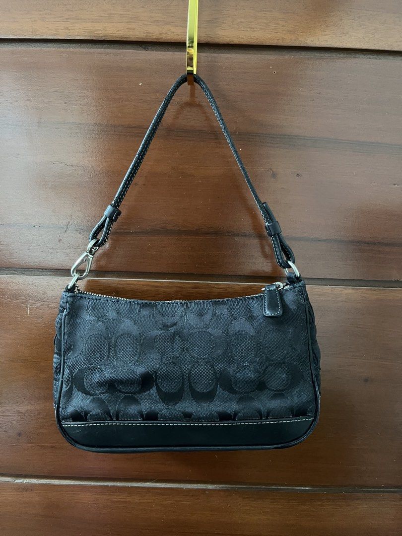 Coach demi bag in black (Category: Shoulder Bags) located in Manila. Submitted by all.love.thrift.shop.v2 (Listing ID 1459768642, Image 3). Description: For sale Coach demi black Declared as project bag Flaws: need restitch some parts of the canvas Rubber edges on base needs replacement, cracks on strap Malinis pa po yung loob ₱1,200 shipped via j&t.