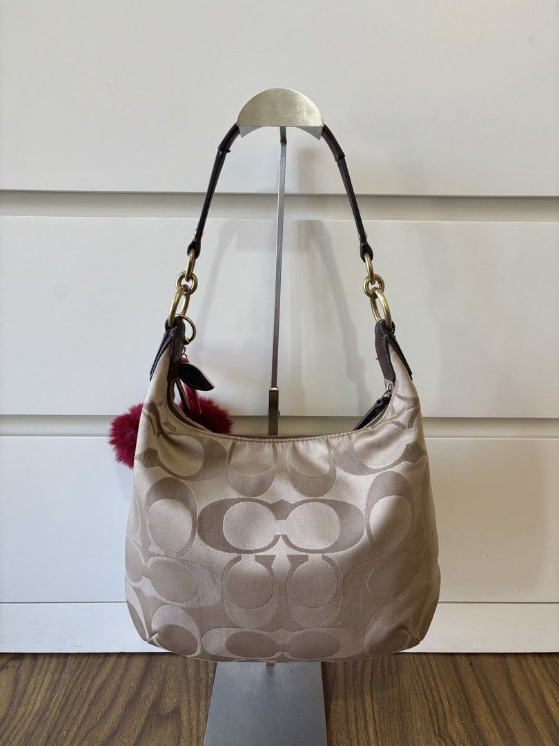 Coach Kristin Hobo Bag (Category: Shoulder Bags) located in Manila. Submitted by vintage.maem (Listing ID 1459762617, Image 2). Description: CCH Kristin Hobo Bag Code: 19335 *𝘤𝘩𝘢𝘳𝘮 𝘯𝘰𝘵 𝘪𝘯𝘤𝘭𝘶𝘥𝘦𝘥* Condition: 8.9/10 Rank A Mine: ₱3599 ⚠️ Signs of wear on leather parts, minimal fading on hardwares.