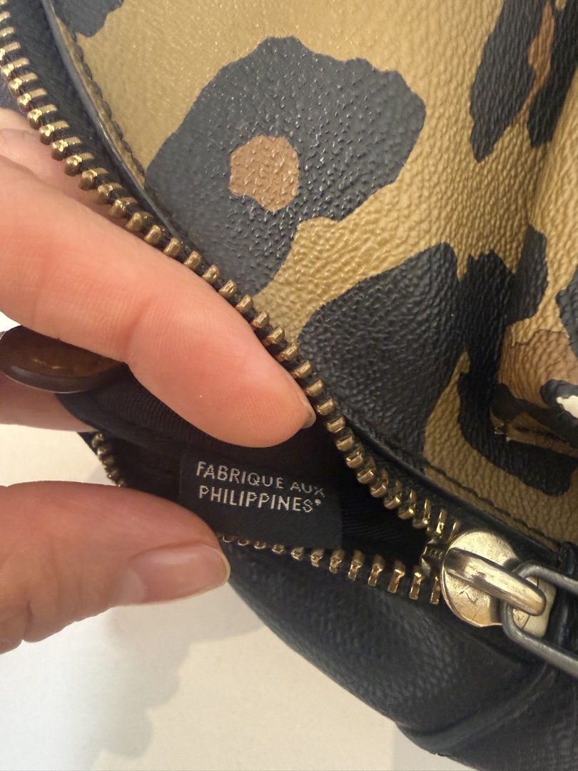 Coach Leopard Mini Backpack (Category: Backpacks) located in Angeles City. Submitted by bagpriceinfiniteluck (Listing ID 1459805713, Image 2). Description: 💯Coach Leopard Mini Backpack Made from Coated Canvas and Smooth Leather with Gold Toned Hardware Adjustable strap, .