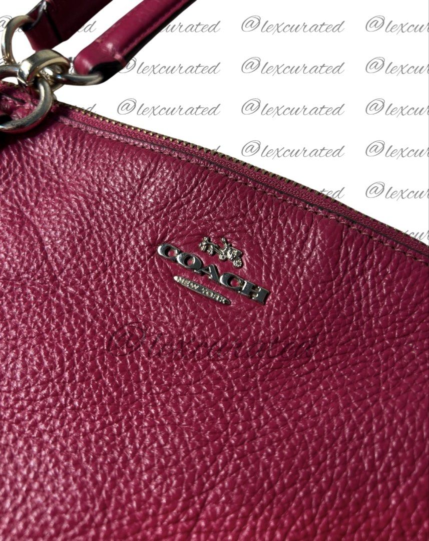 Coach Pebble Leather Shoulder Bag - Magenta (Category: Shoulder Bags) located in Manila. Submitted by lexcurated (Listing ID 1459854318, Image 1). Description: - Authentic Magenta Coach Shoulder Bag - Made from premium pebble leather - Secure zip-top closure - Comfortable double shoulder straps - Elegant silver hardware details - Ample interior space for essentials - Ideal for daily use and versatile styling.