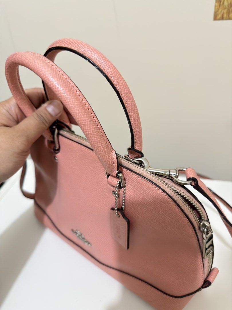 Coach Pink Leather Dome Satchel Bag (Category: Luxury Bags & Wallets) located in Pasig City. Submitted by cl_rissa (Listing ID 1459720535, Image 2). Description: Coach Mini Sierra Satchel Bought in th me US Flaws are posted Disclaimer: These are pre-loved items and may need some cleaning. They’ve been stored in a box for a few months, so please manage your expectations regarding their condition. 😊￼.