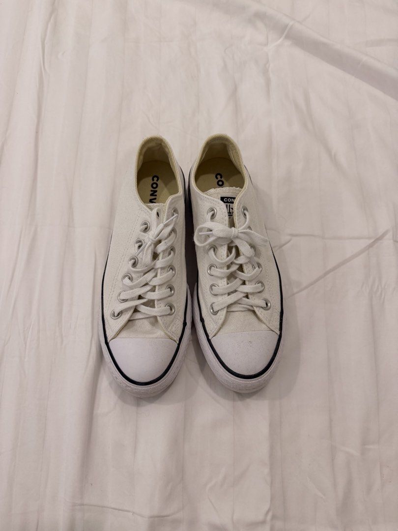 CONVERSE All STAR LOW TOP SNEAKERS (Category: Sneakers) located in Abulug. Submitted by joysmithznjo (Listing ID 1459836455, Image 1). Description: - White Converse Chuck Taylor sneakers - Low top, lace-up style - Classic iconic design - Platform sole for extra height - Versatile for casual wear - Easy to pair with any outfit.