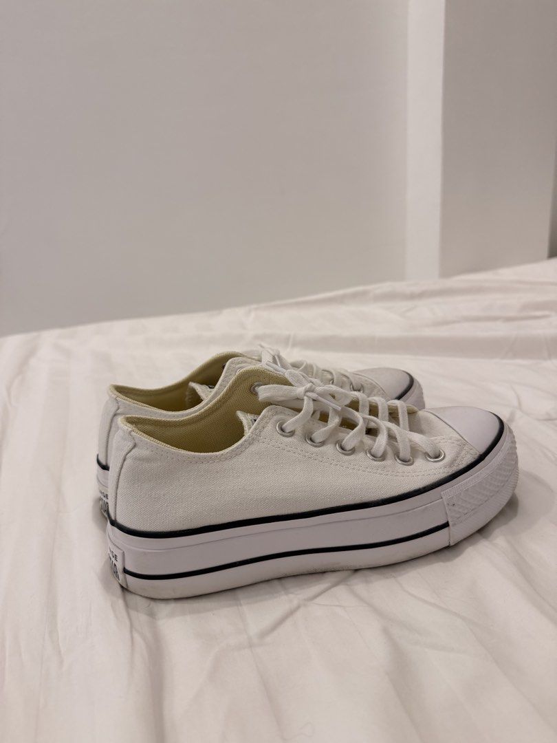 CONVERSE All STAR LOW TOP SNEAKERS (Category: Sneakers) located in Abulug. Submitted by joysmithznjo (Listing ID 1459836455, Image 2). Description: - White Converse Chuck Taylor sneakers - Low top, lace-up style - Classic iconic design - Platform sole for extra height - Versatile for casual wear - Easy to pair with any outfit.