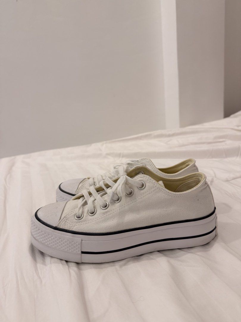 CONVERSE All STAR LOW TOP SNEAKERS (Category: Sneakers) located in Abulug. Submitted by joysmithznjo (Listing ID 1459836455, Image 3). Description: - White Converse Chuck Taylor sneakers - Low top, lace-up style - Classic iconic design - Platform sole for extra height - Versatile for casual wear - Easy to pair with any outfit.