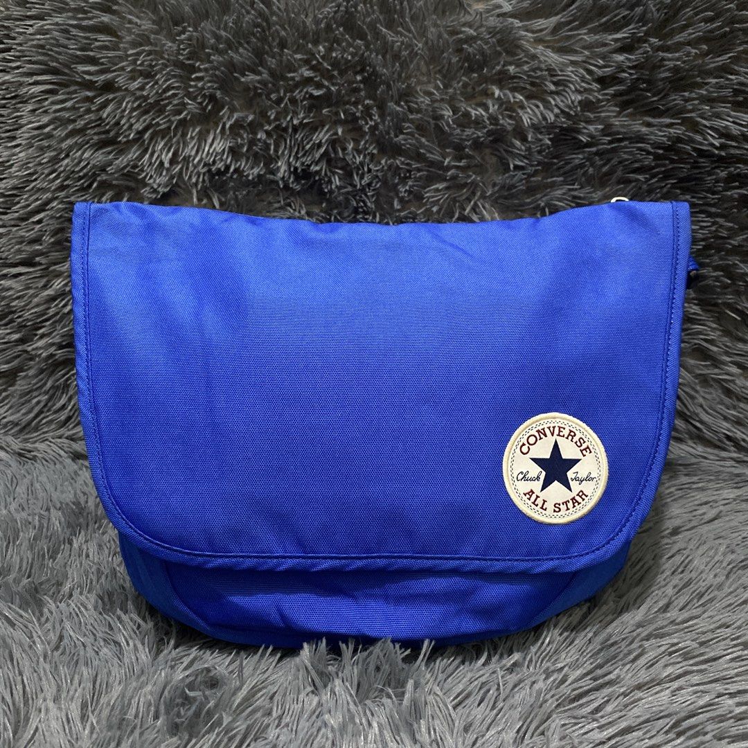 Converse messenger bag (Category: Belt bags, Clutches and Pouches) located in Manila. Submitted by saint.m (Listing ID 1459780839, Image 1). Description: Messenger bag Length: 11 inches Width: 14 inches Condition: 9/10 Color rate: 9.5/10 .