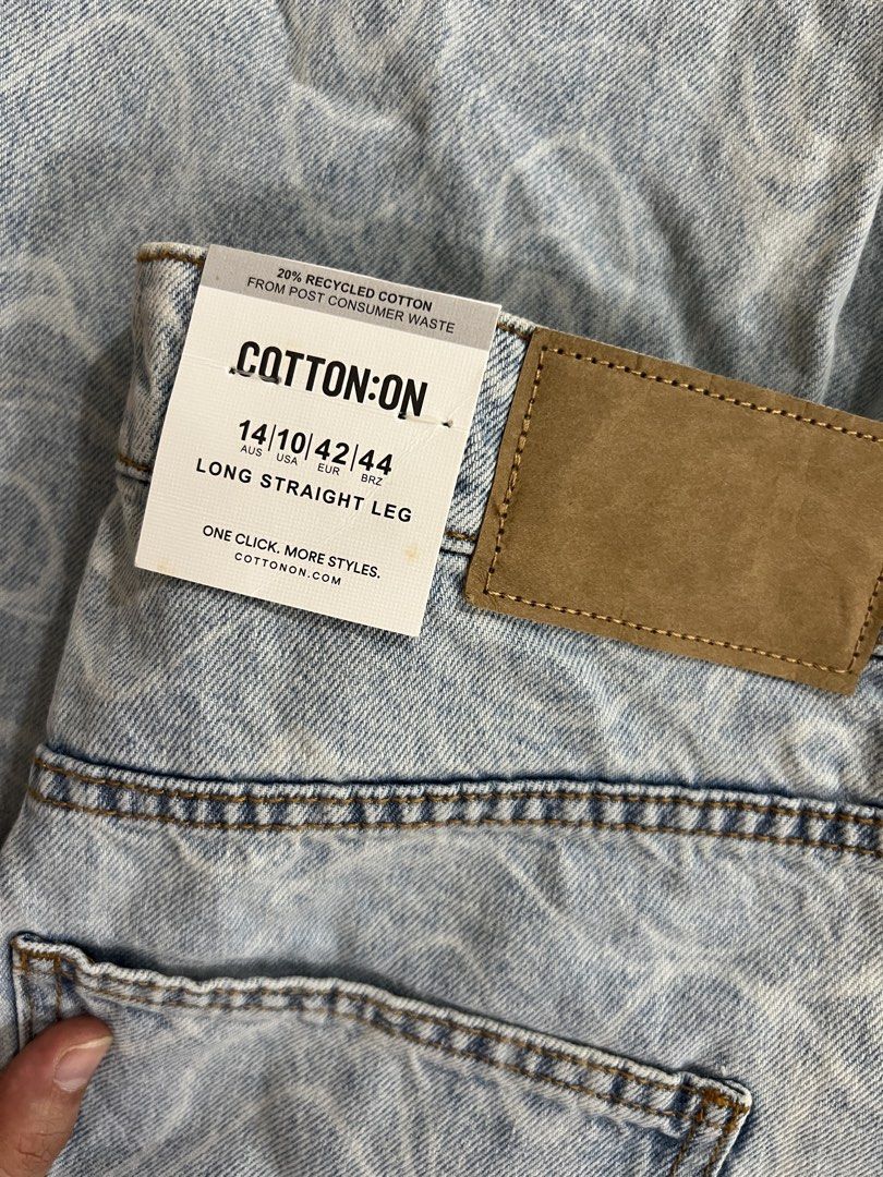 Cotton On Long Straight Leg Jeans - Light Wash Pattern (Category: Jeans) located in Quezon City. Submitted by bitsxpieces (Listing ID 1459708614, Image 2). Description: - Brand new Cotton On jeans with tag still attached. - Light wash denim with a unique abstract pattern. - Long, straight leg fit for a classic silhouette. - Made with 20% recycled cotton, a sustainable choice. - Ideal for creating effortless casual outfits..