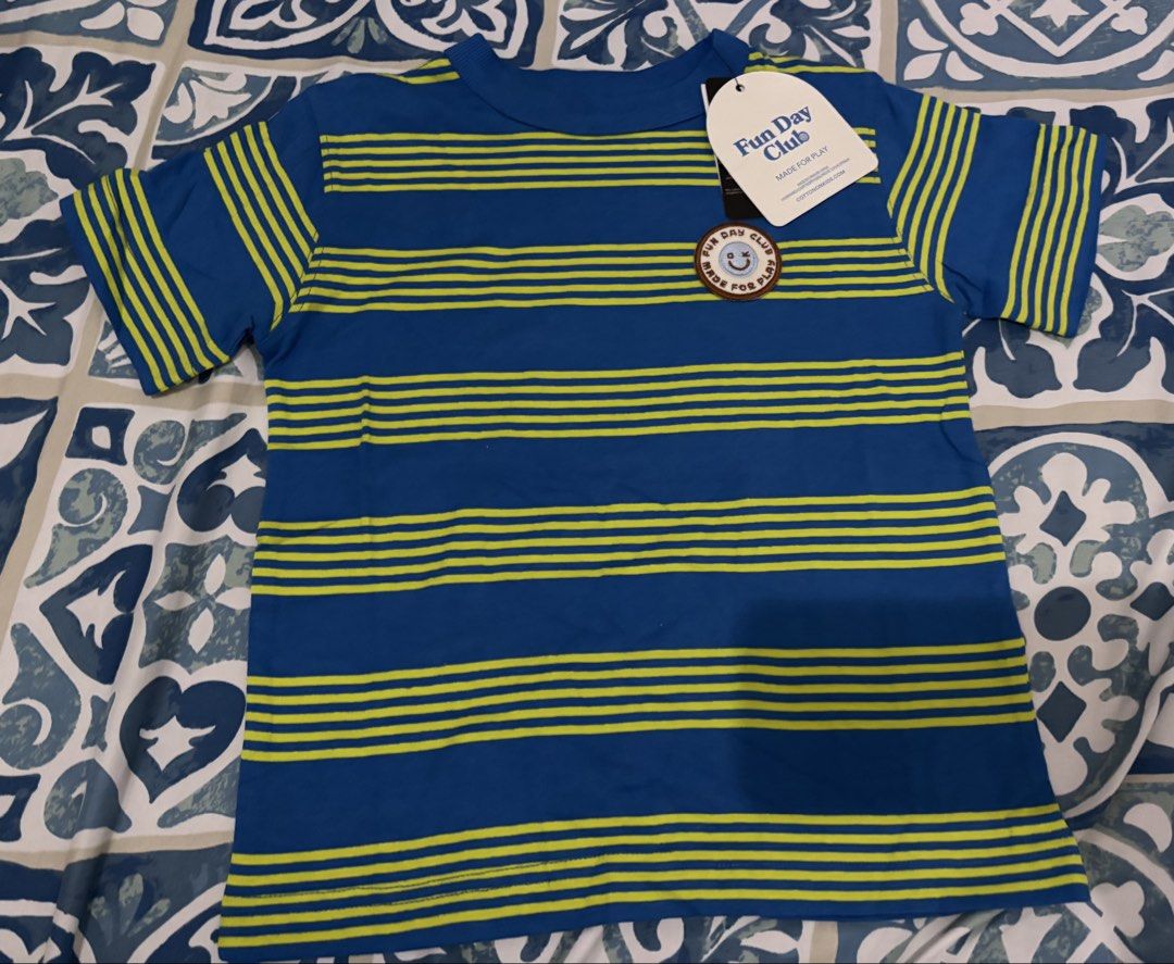 Cotton on shirt size 4y (Category: Babies & Kids Fashion) located in San Jose del Monte. Submitted by letsdeclutterthis (Listing ID 1459791292, Image 2). Description: 250 each 2 for 400.