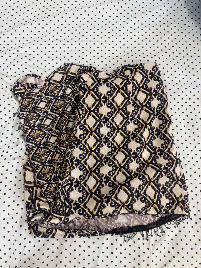 Cream and Navy Diamond Pattern Top with Lace Trim (Category: Sleeveless) located in Manila. Submitted by lovely_parrot (Listing ID 1459775068, Image 1). Description: - Cream top with a chic navy and gold diamond pattern. - Features a cute black lace trim at the hem. - Estimated size: Small to Medium. - Perfect for both casual outings and dressing up..