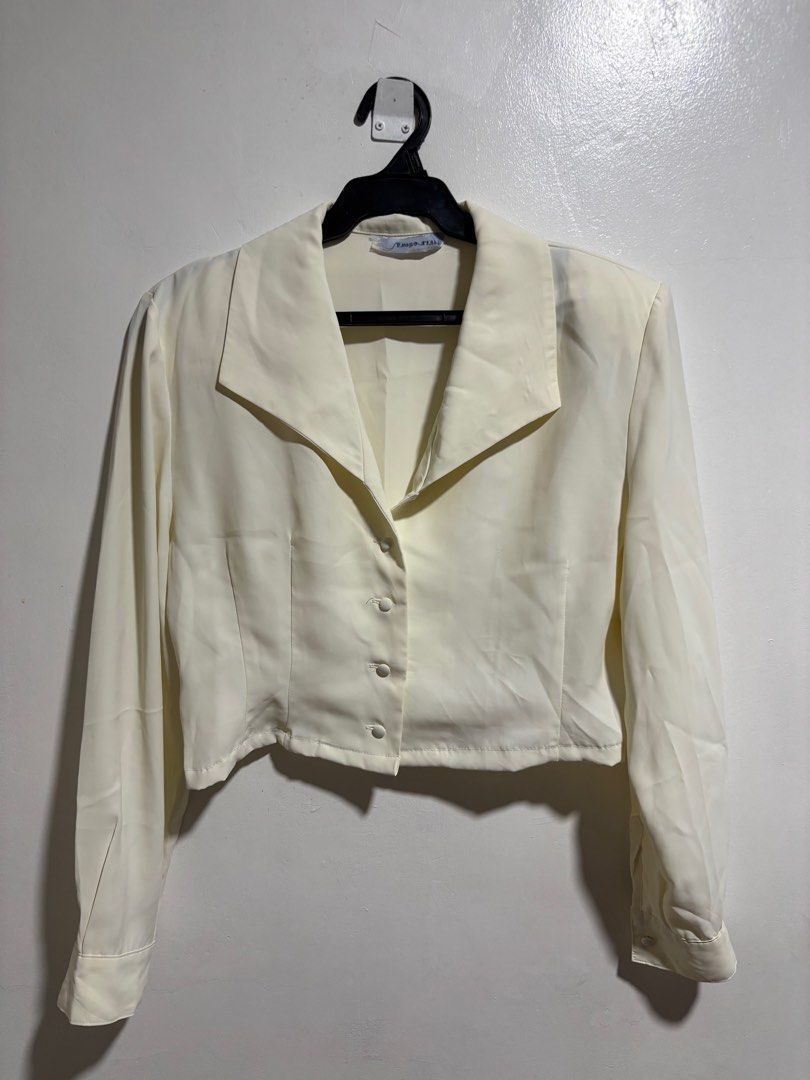 Cream colored Crop Polo Top (Category: Blouses) located in Cavite. Submitted by aceepreeloved (Listing ID 1459778916, Image 1). Description: Size: Small-Medium Pit to pit (Width): 18.5 in Waist: 15.5 in Length: 16.5 in Arm seam: 16 in Shoulder: 17 in (Note: Please know and check your measurements. I cannot, most of the time, provide “when worn” because of my job. Please bear with me.) RFS: Decluttering Mode of Payment (MOP): GCash or Maribank Mod