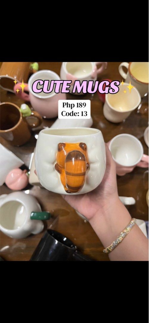Cute Animal Tail Mug - Code 13 (Category: Coffee & Tea Tableware) located in Cavite. Submitted by thinkerbelle_certified (Listing ID 1459811254, Image 1). Description: - Super cute mug with an adorable animal tail design. - Perfect for your morning coffee or tea. - Makes a fantastic gift for any animal lover. - Price: Php 189 - Item Code: 13.