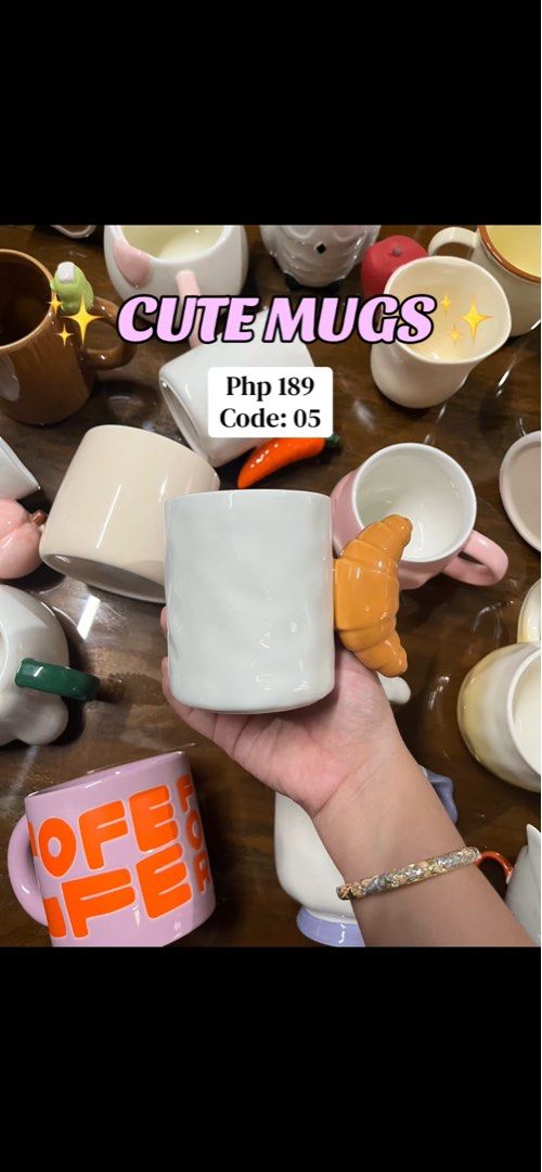 Cute Ceramic Mugs with Fun Designs (Category: Coffee & Tea Tableware) located in Cavite. Submitted by thinkerbelle_certified (Listing ID 1459808420, Image 1). Description: - Adorable mugs perfect for your morning coffee or tea. - Features unique designs: croissant handle and fun text. - Great as a gift or for your own collection. - Price: Php 189 each..