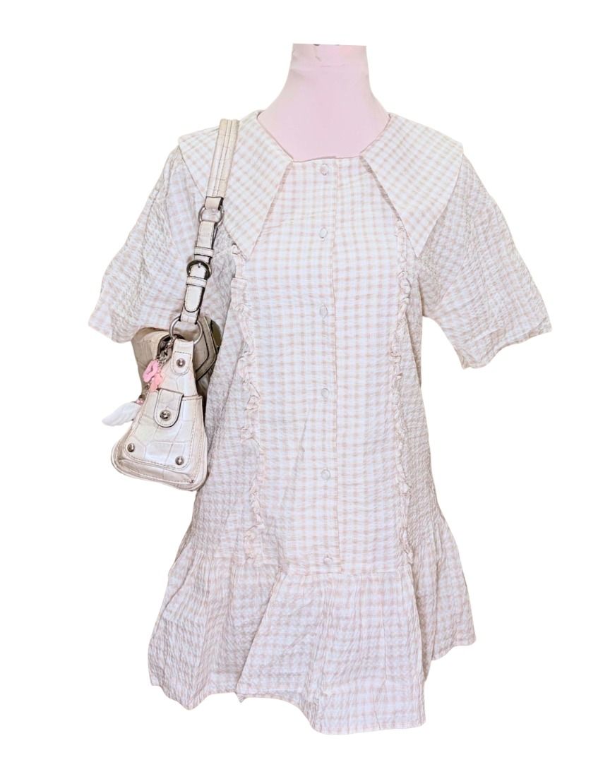 Cute Gingham Dress with Peter Pan Collar (Category: Dresses) located in Baguio. Submitted by ellamell (Listing ID 1459735695, Image 1). Description: 155cm height 76cm bust - Has an inner - Sweet gingham print dress - Features a large Peter Pan collar - Short sleeves with a ruffled hem - Button-up front closure - Textured fabric for a nice feel - Perfect for pairing with a small handbag Brand: Divided.