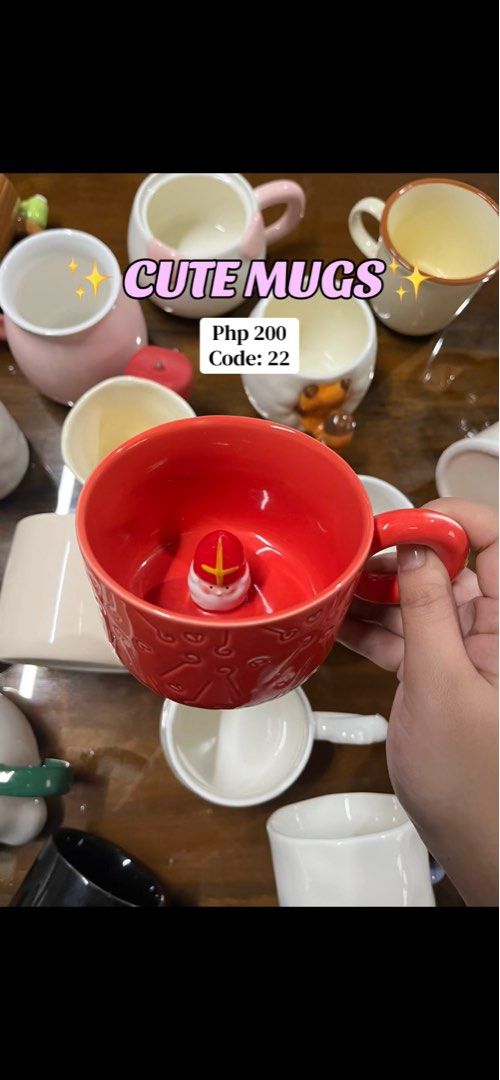 Cute Mugs - Php 200 (Category: Coffee & Tea Tableware) located in Cavite. Submitted by thinkerbelle_certified (Listing ID 1459812041, Image 1). Description: - Adorable mugs perfect for your morning coffee or tea. - Each mug features a unique and charming design. - Special red mug includes a cute character hidden inside! - Price: Php 200 per mug..