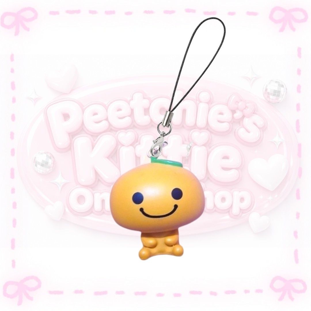 Cute Orange Mushroom Charm with Strap (Category: Charms) located in Sorsogon. Submitted by mitchelle0425 (Listing ID 1459872622, Image 1). Description: - Adorable orange mushroom charm with a happy face - Features a green stem on top - Comes with a black strap and a silver clasp - Ideal for decorating bags, phones, or keychains - A super cute and fun accessory.