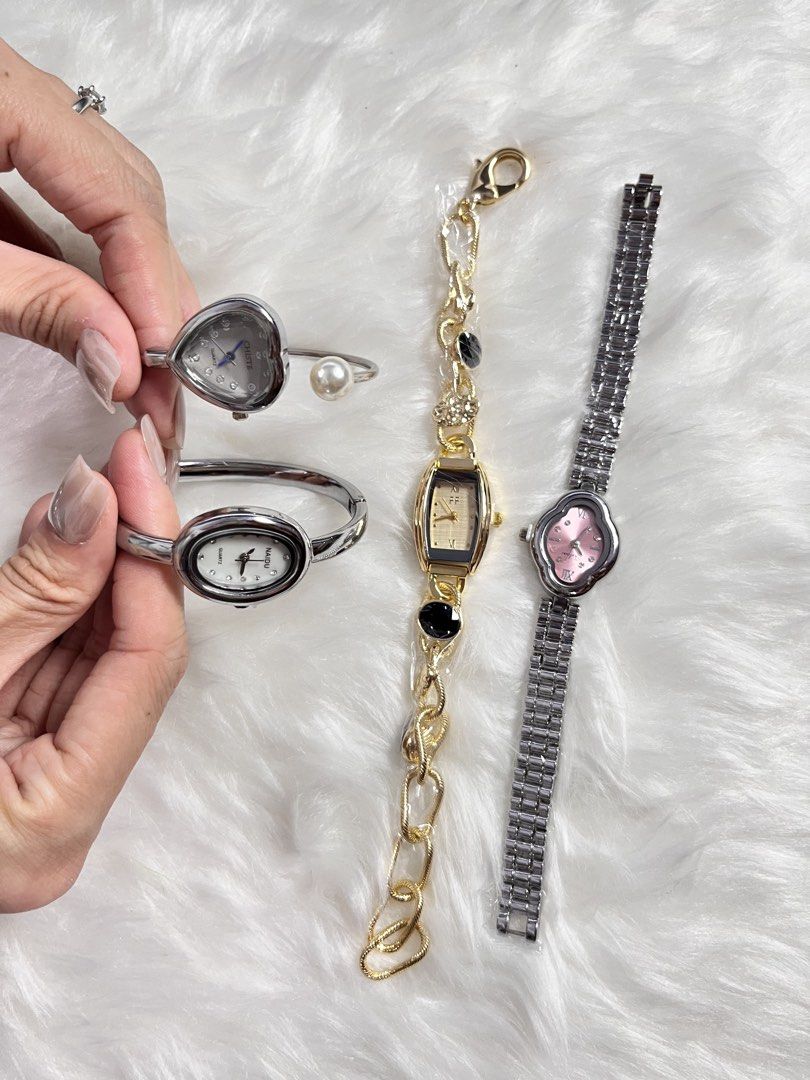DAINTY WATCH NEW DESIGNS (Category: Women's Watches) located in Bulacan. Submitted by itsjellee (Listing ID 1459822802, Image 3). Description: ♡ Stainless Steel ♡ Non-tarnish with proper care ♡ FREE watch box ♡ WITH working battery ♡ FREE strap adjustment tool ♡ FREE earrings ♡ FREE random stickers ♡ Available via shapi Checkout 💌 Limited stocks available. Send us a message to order! .