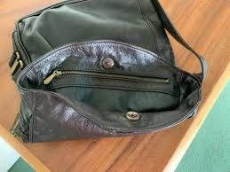 DANIER SHOULDER BAG (Category: Shoulder Bags) located in Caloocan City. Submitted by foncimigz (Listing ID 1459856446, Image 3). Description: Danier Genuine Leather Slouchy Shoulder Satchel Bag – Dark Olive Green / Charcoal negotiable .