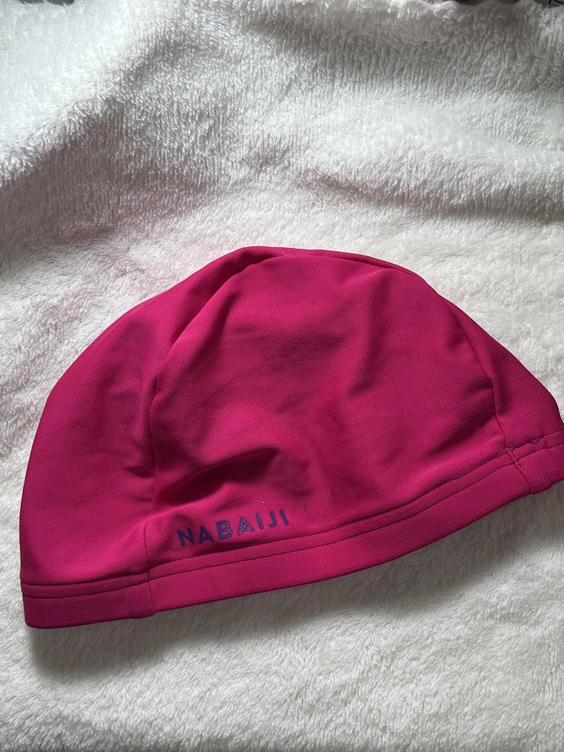 Decathlon Junior Swim Cap - Pink (Category: Water Sports) located in Marikina City. Submitted by rheigee (Listing ID 1459801430, Image 1). Description: - Pink Nabaiji fabric swim cap from Decathlon - Designed for juniors (kids or teens) but can fit an adult with small head - Never used, just a spare one - Selling to declutter.