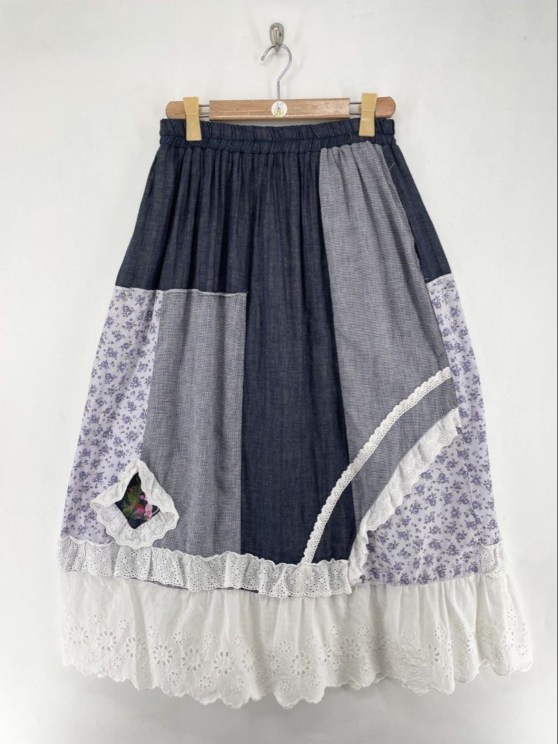 Denim Cotton Floral Patchwork Midi Skirt (Category: Skirts) located in Mandaluyong City. Submitted by armrhts (Listing ID 1459838723, Image 1). Description: Size: Free Size Dimensions(inches) •Waist/Width : 29"-44" •Hip: 29 •Outseam/Length : 33 •Leg Opening: 30".