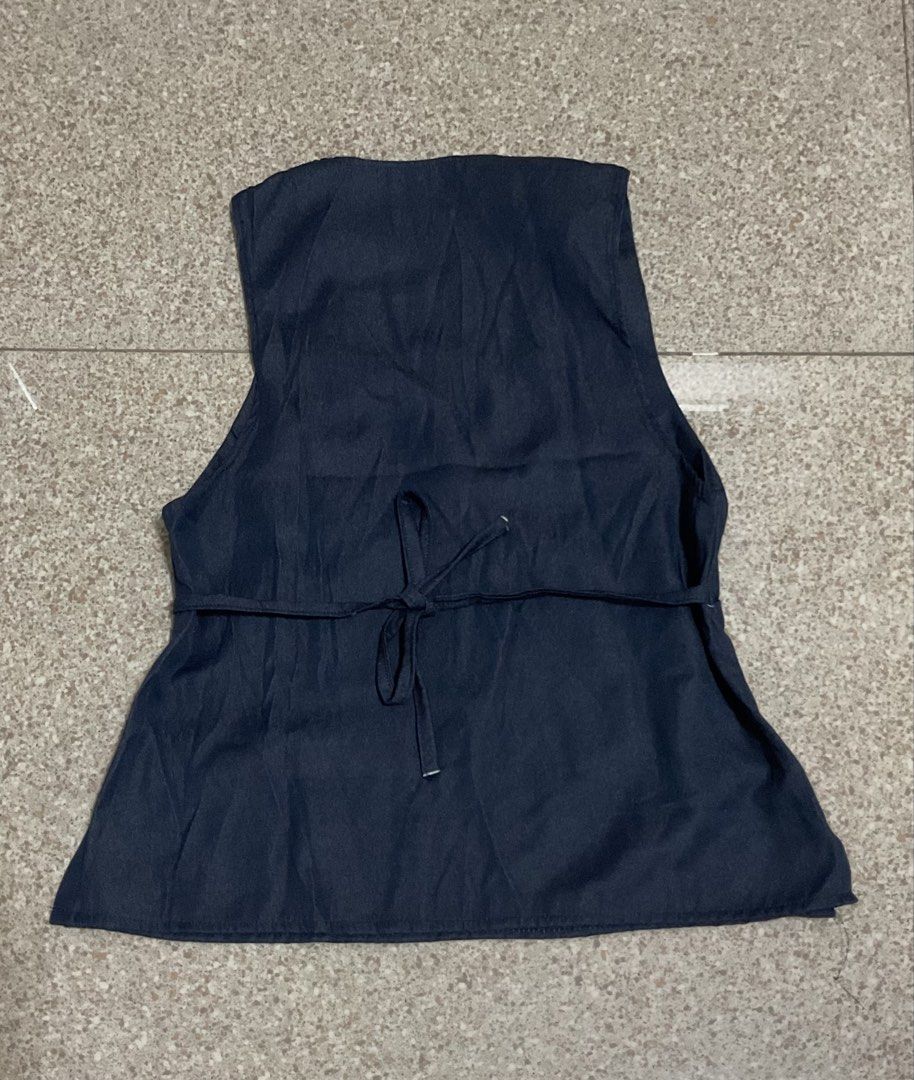 Denim V-Neck Sleeveless Top (Category: Sleeveless) located in Manila. Submitted by ilovecheesyramen (Listing ID 1459831465, Image 2). Description: 🪩 never been used! too small on me :( 🪩 can be tied on the back 🪩 rfs: decluttering 🪩 fits size XS-S.