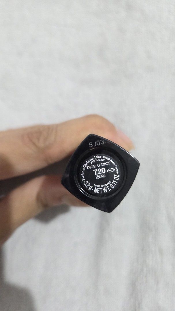 Dior Iconic Lipstick - Shade 720 (Icone) (Category: Makeup) located in Taguig. Submitted by tipidd (Listing ID 1459737554, Image 2). Description: - Authentic Dior Iconic Lipstick - Shade: 720 (Icone) - Features: Iconic black case with silver 'CD' logo - Texture: Smooth application - Versatile: Ideal for everyday wear or evening events - Condition: Comes with original case.