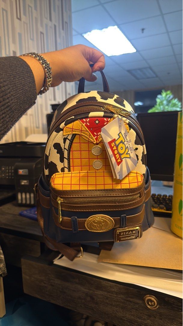 Disney Pixar Woody Back Pack (Category: Backpacks) located in Mandaluyong City. Submitted by anglvlsn (Listing ID 1459701606, Image 1). Description: FOR SALE — Disney Pixar Toy Story Woody Mini Backpack 🤠 ✨ Cute Woody-inspired design ✨ Authentic details & badge ✨ Perfect for Toy Story fans and collectors ✨ Great for display or everyday use shipping available. Rfs: my son doesn’t want to use if he already have other character bag Loc: makati .