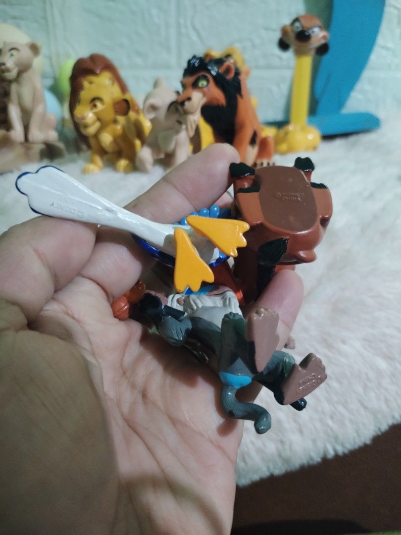 Disney The Lion King Figurines Set (Category: Figurines & Statues) located in Manila. Submitted by malditas (Listing ID 1459807377, Image 3). Description: - Complete The Lion King character figurine collection - Includes Simba, Mufasa, Scar, Nala, Timon, Pumbaa, and Zazu - Some figurines feature official Disney branding - Ideal for The Lion King collectors and fans - Great for display or imaginative play.