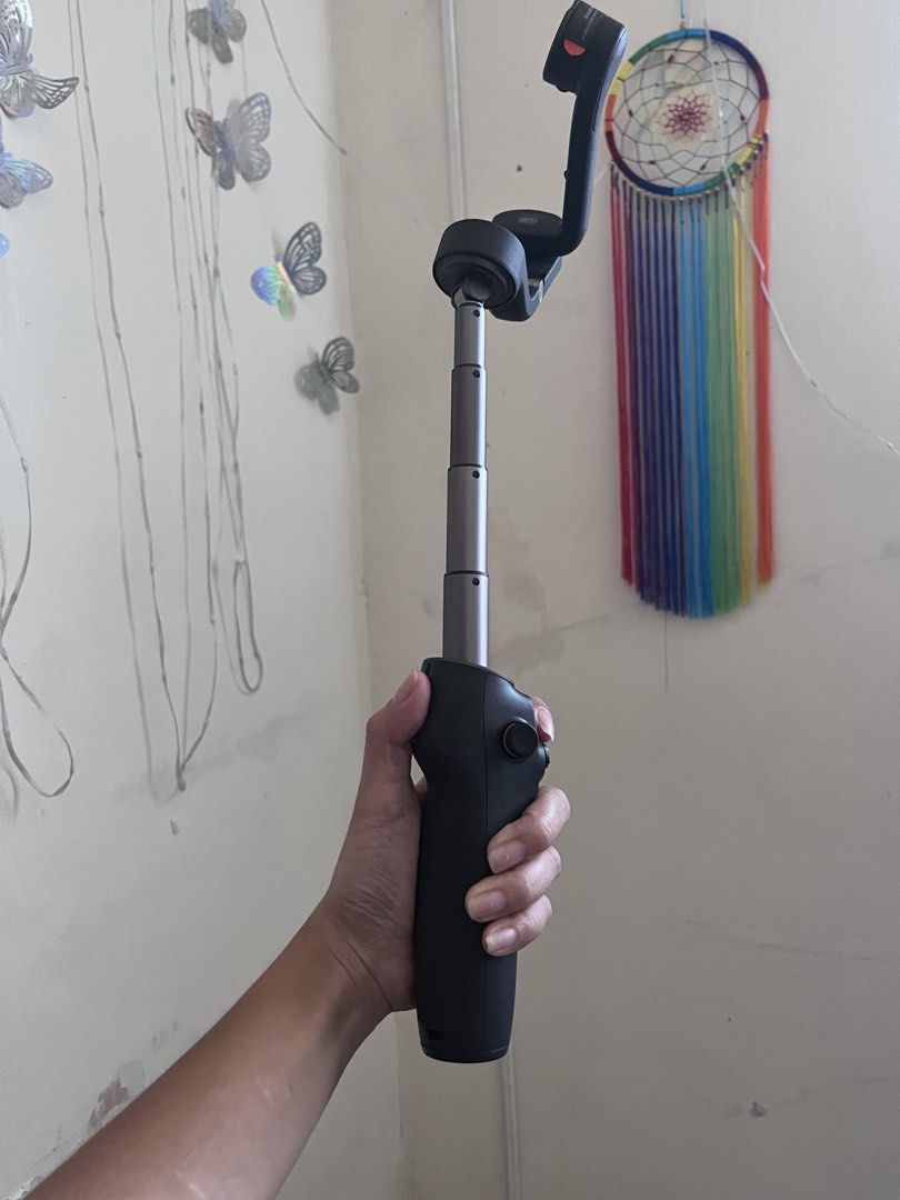 DJI Osmo gimbal (Category: Gimbals & Stabilizers ) located in Valenzuela. Submitted by phearlzstorm (Listing ID 1459703309, Image 1). Description: - missing yung Genuine DJI OM Magnetic Phone Clamp 3 - Compatible with DJI Osmo Mobile - Achieve smooth, stabilized video footage - Quick and easy to attach/detach - Essential accessory for mobile videography.