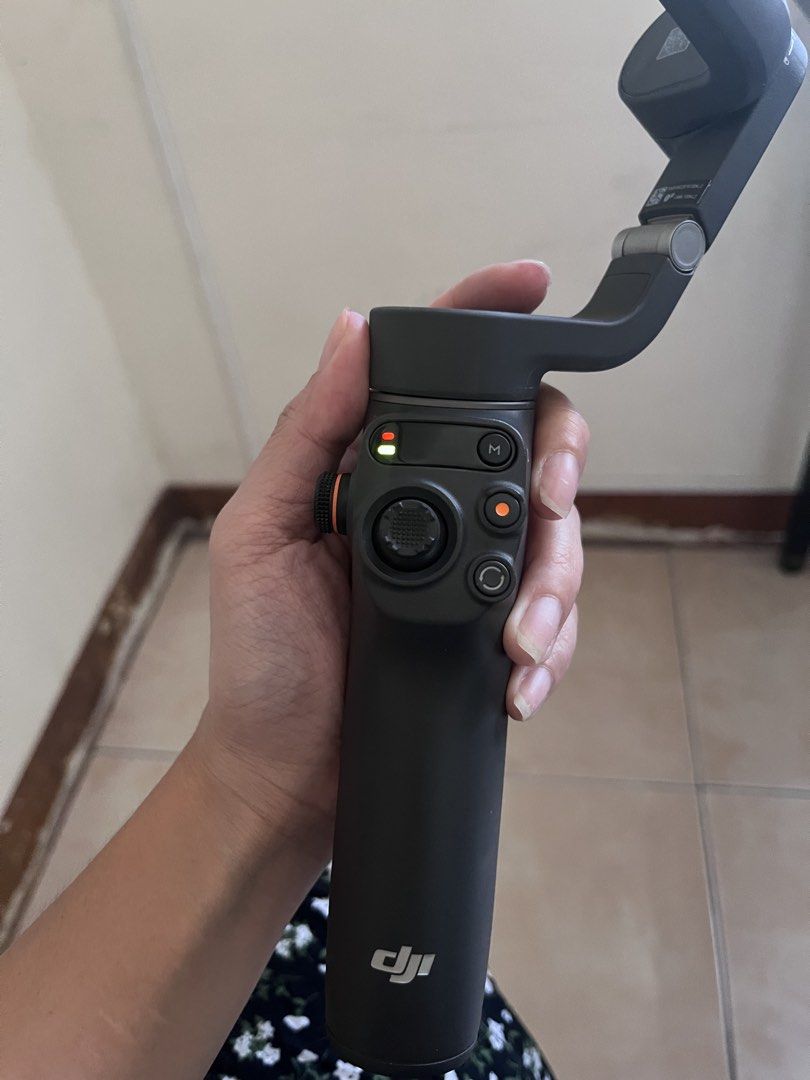 DJI Osmo gimbal (Category: Gimbals & Stabilizers ) located in Valenzuela. Submitted by phearlzstorm (Listing ID 1459703309, Image 3). Description: - missing yung Genuine DJI OM Magnetic Phone Clamp 3 - Compatible with DJI Osmo Mobile - Achieve smooth, stabilized video footage - Quick and easy to attach/detach - Essential accessory for mobile videography.