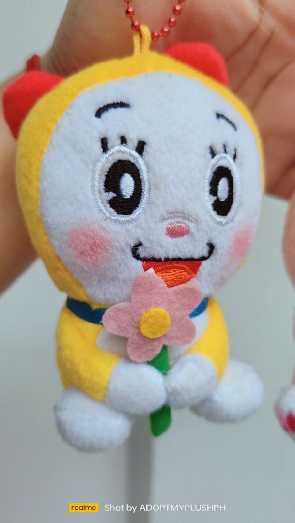Dorami-chan Doraemon Plush Keychain Charms (Category: Plushies & Soft Toys) located in Taguig. Submitted by adopt.my.plush.ph (Listing ID 1459897572, Image 2). Description: 160.00 each Dorami-chan mini plush keychain with embroidered details: Classic Dorami holding a pink felt flower Sakura Dorami with heart-shaped eyes and cherry blossom details *as is, WYSIWYG ‼️Photos have been uploaded for your reference. Kindly make sure to review them ALL b