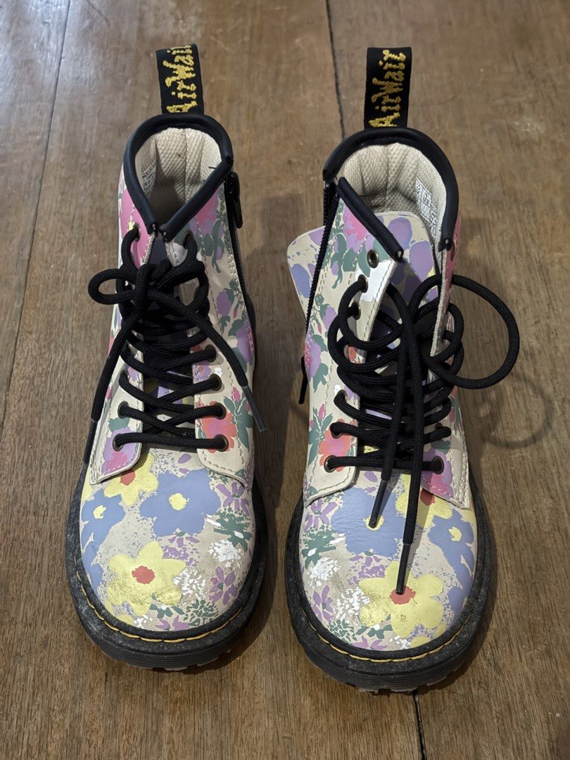Dr. Martens 1460 J Floral Boots (Category: Boots) located in Marikina City. Submitted by cbcloset (Listing ID 1459803902, Image 2). Description: - Dr. Martens 1460 J boots - Fun floral print - Size: 1 US / 32 EU / 13 UK - Laces and side zip for easy wear - Classic yellow stitching on sole - Great for kids who love color.