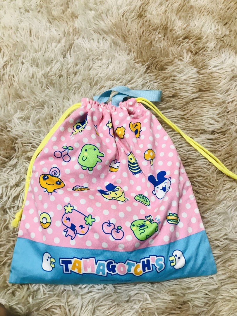 DRAWSTRING POUCH (Category: Purses & Pouches) located in Gamu. Submitted by 2022bagsbunny (Listing ID 1459710826, Image 1). Description: .