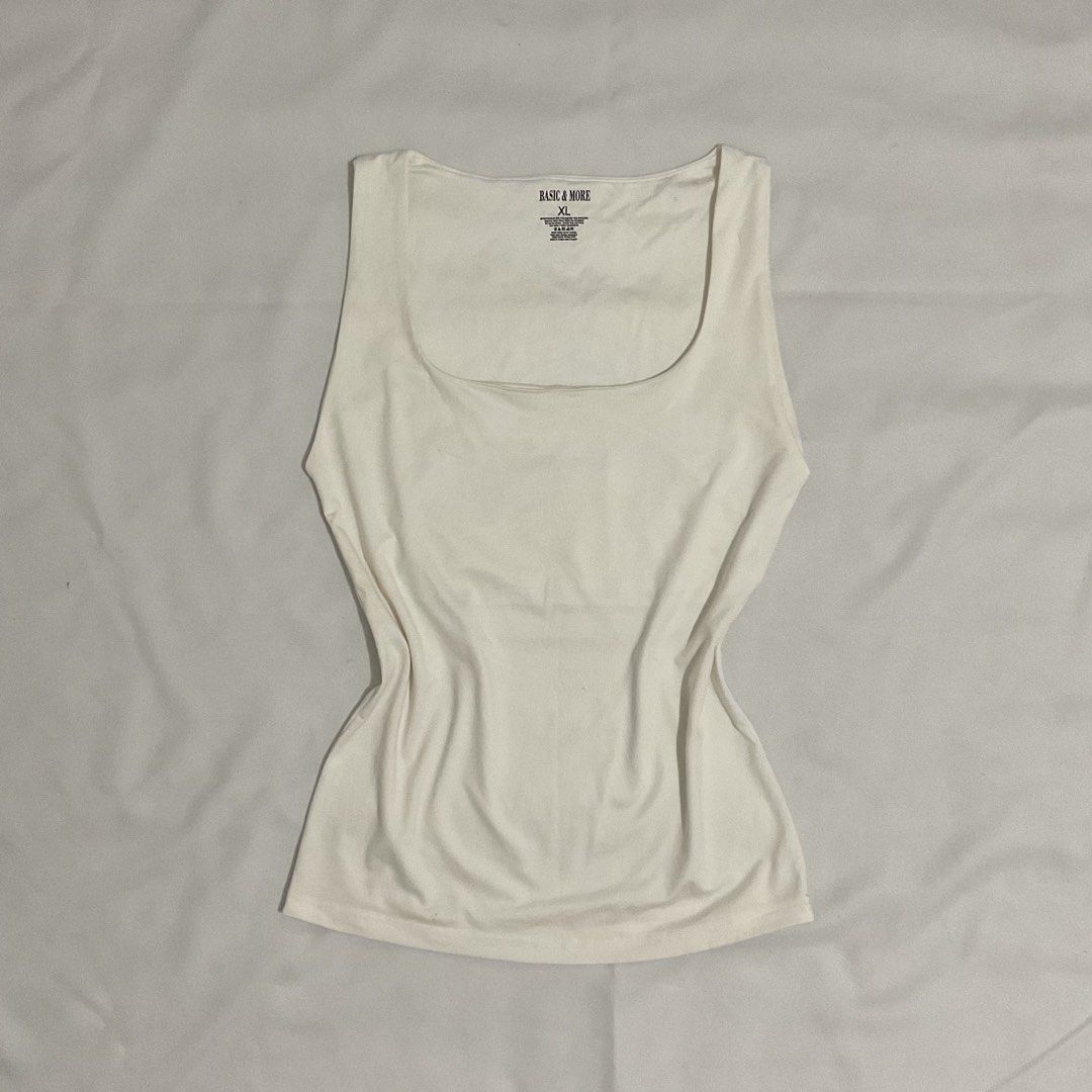 E002 | Basic & More XL White Sleeveless Basic Top Casual Top Office Top (Category: Sleeveless) located in Caloocan City. Submitted by de_clothur (Listing ID 1459713648, Image 1). Description: Mannequin Measurements: Waist: 25” Hips: 34”-35” Bust: 34”-35” Shoulder to Shoulder: 16” Torso: 22”.