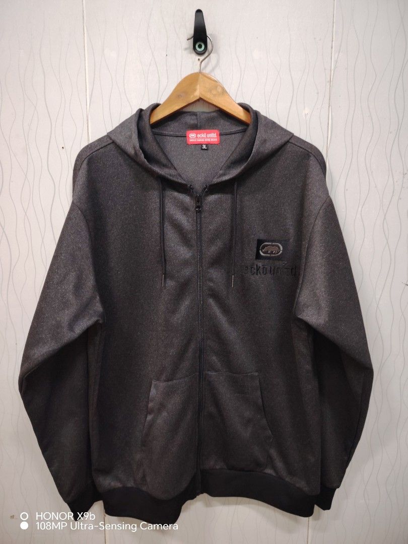 Ecko Unltd. Grey Zip-Up Hoodie (Category: Hoodies) located in Navotas City. Submitted by focalpoint2782 (Listing ID 1459780520, Image 1). Description: - Length 29 - Width 25 - Grey Ecko Unltd. zip-up hoodie - Size: 3XL - Features classic embroidered Ecko logo on chest - Includes hood and front pockets - Ideal for casual everyday wear Location : Navotas City Currier : Lalamove Or J&t Express Mop : Cash Or Gcash Payments.