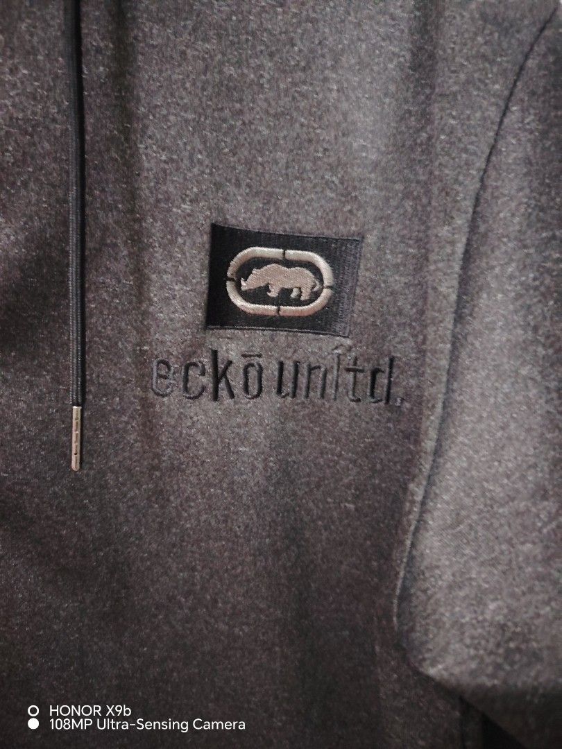 Ecko Unltd. Grey Zip-Up Hoodie (Category: Hoodies) located in Navotas City. Submitted by focalpoint2782 (Listing ID 1459780520, Image 3). Description: - Length 29 - Width 25 - Grey Ecko Unltd. zip-up hoodie - Size: 3XL - Features classic embroidered Ecko logo on chest - Includes hood and front pockets - Ideal for casual everyday wear Location : Navotas City Currier : Lalamove Or J&t Express Mop : Cash Or Gcash Payments.