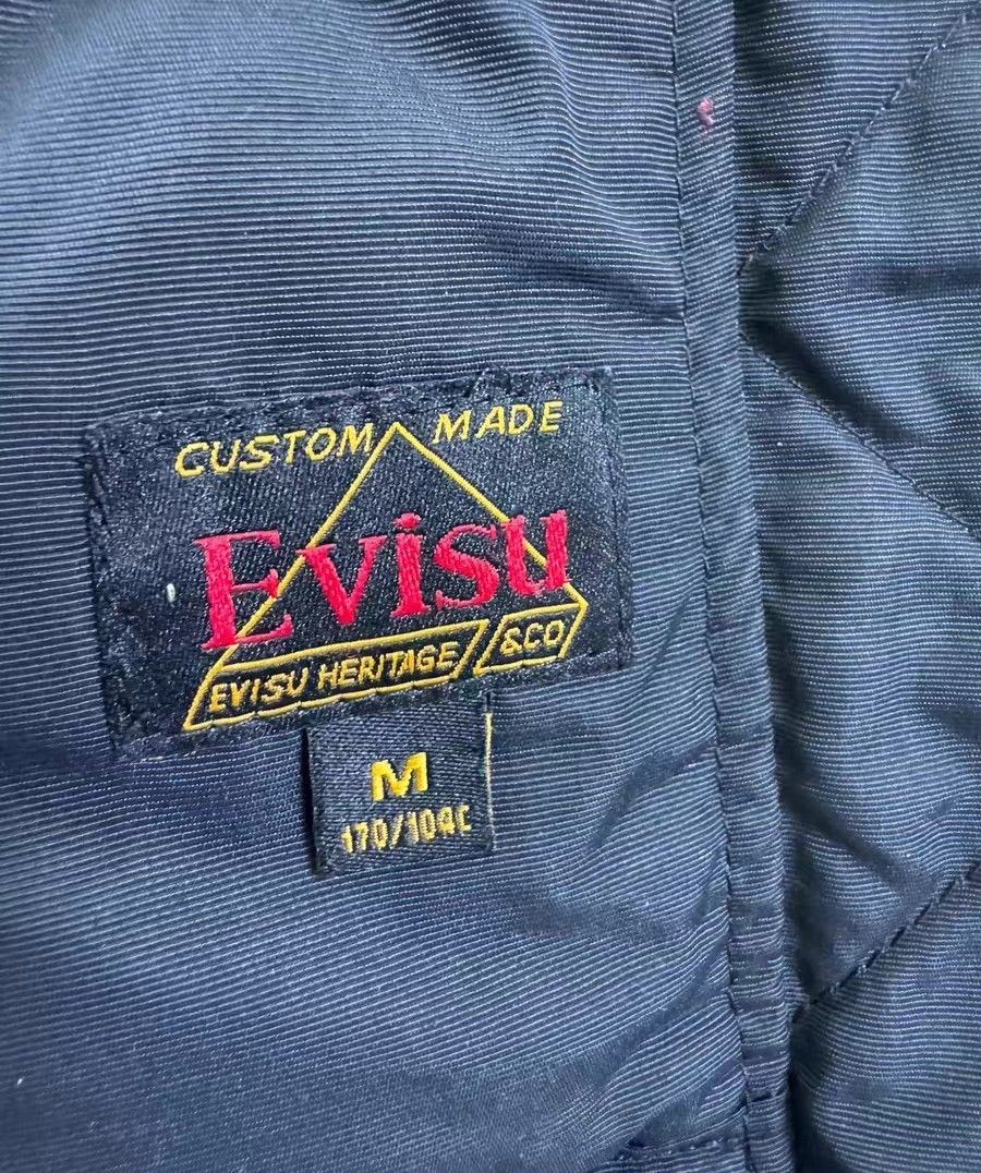 Evisu down jacket (Category: Coats, Jackets and Outerwear) located in Singapore. Submitted by sgdenim (Listing ID 1459709242, Image 4). Description: chest 122 length 71 shoulder 50 sleeve 57 paynow for free delivery or pay to carousell receive in 10-15days item will be authenticated.