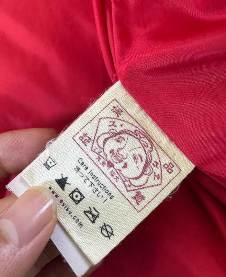 Evisu down jacket (Category: Coats, Jackets and Outerwear) located in Singapore. Submitted by sgdenim (Listing ID 1459709242, Image 5). Description: chest 122 length 71 shoulder 50 sleeve 57 paynow for free delivery or pay to carousell receive in 10-15days item will be authenticated.