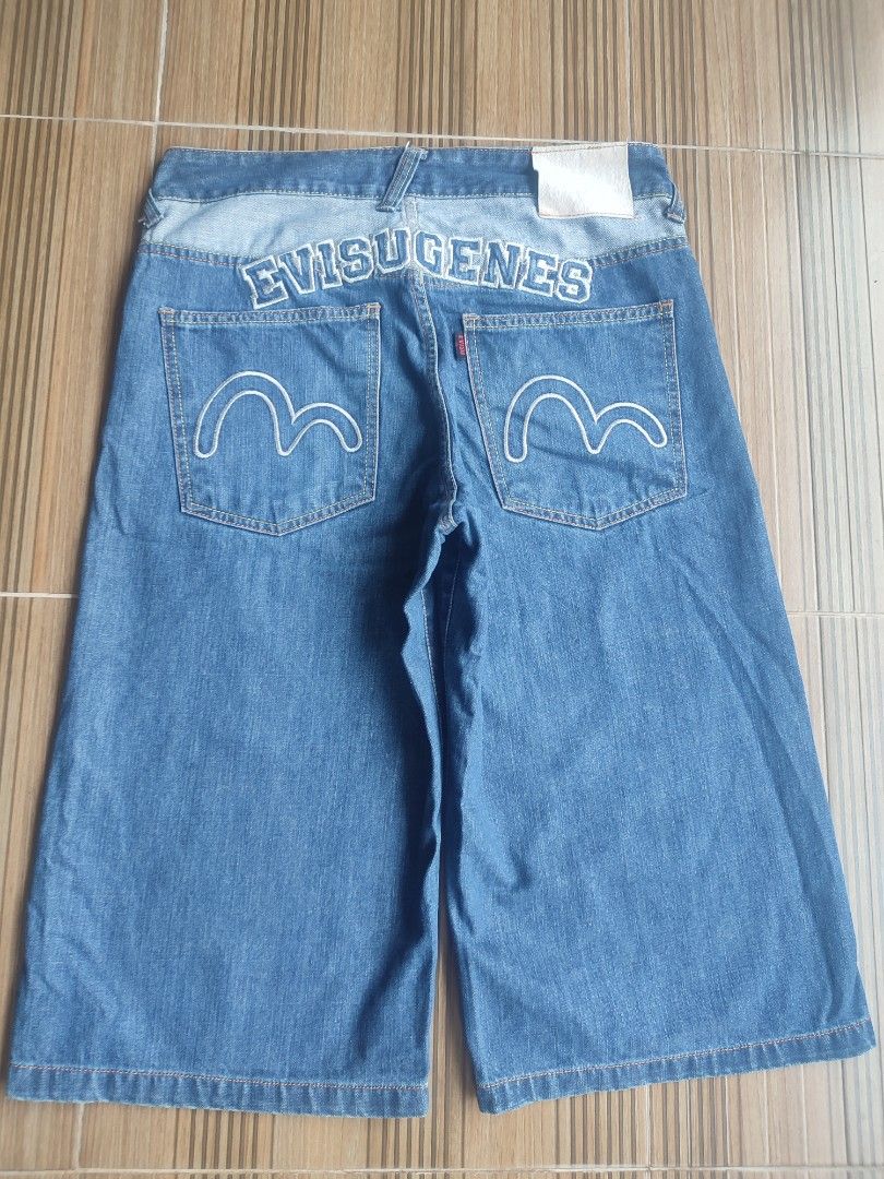 Evisu Genes Denim Jeans Long Jorts (Category: Jeans) located in Caloocan City. Submitted by krarens.segundamano (Listing ID 1459783463, Image 1). Description: - Brand: Evisu - Style: Wide leg cropped denim jeans - Wash: Classic blue - Features: Iconic Evisu logo on back pockets - Closure: Button and zip front - Look: Ideal for casual streetwear.