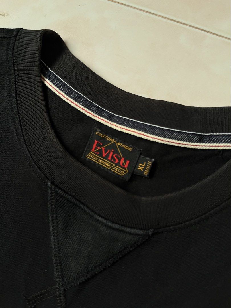 Evisu shirt (embroided) (Category: Tshirts & Polo Shirts ) located in San Jose. Submitted by renzthriftomindoro (Listing ID 1459711768, Image 2). Description: Evisu shirt (embroided) Actual dimes Width- 21.5 Length- 27 Issue minimal fade on front triangle design close to neck 9/10 color rate or better.