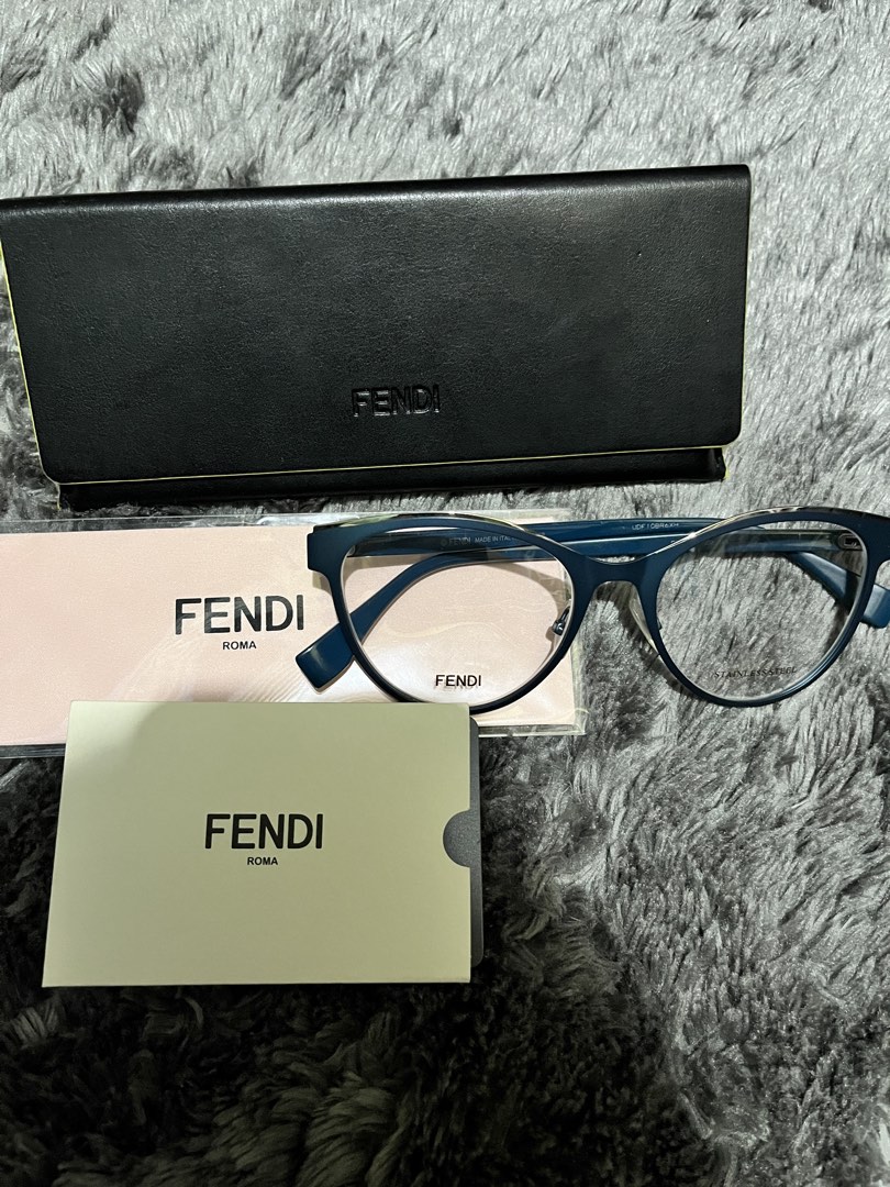Fendi Navy Blue Cateye eyeglasses (Category: Luxury Accessories) located in Marikina City. Submitted by itsmejerome3030 (Listing ID 1459805204, Image 2). Description: Brand: Fendi Size: 53-17-140 (53mm lens width, 17mm bridge width, and 140mm temple arm length) Color: Navy Blue Issue: None Inclusion: Authenticity card, original case and cleaning cloth PS I’ll make sure shipped items are presentable, however kindly manage your expectations since i