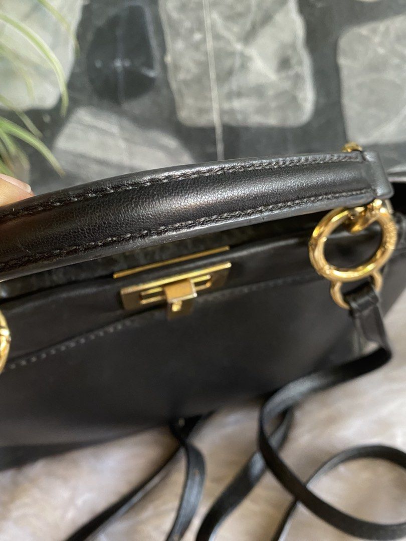 Fendi Peekaboo Black Leather Mini Handbag (Category: Luxury Bags & Wallets) located in Bacolod City. Submitted by chuchaystuffs (Listing ID 1459742283, Image 3). Description: - Fendi Peekaboo Bag - Color: Black Leather - Size: Mini - Hardware: Gold - Features: Detachable shoulder strap, interior zip pocket - Condition: Clean inside and out - Perfect for daily use or special events - self authentication pro “parang” orig po Sya.