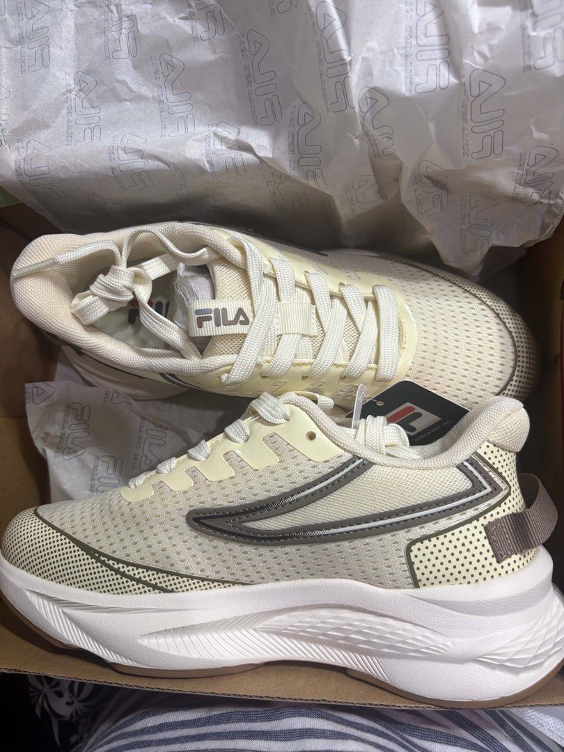Fila Lite Strike Run Beige Running Shoes (Category: Sneakers) located in Manila. Submitted by crisdancal (Listing ID 1459704182, Image 1). Description: - Brand new Fila Lite Strike Run shoes - Color: Beige - Size: 7 US / 37 EUR - Original Price: P2,699.00 - Reason for Selling: Not the right fit - Includes original box Selling for only 1999 Fits philippine size:7.