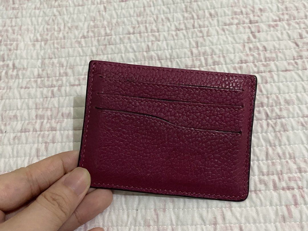 Fino Leather Card Holder (Category: Wallets & Card holders) located in Angeles City. Submitted by dwnmxn (Listing ID 1459737944, Image 2). Description: Authentic Fino Card Holder - Genuine pebble leather in a deep berry color - Multiple card slots - Contrasting gold interior lining - Slim design, fits easily in pockets and small bags - Ideal for keeping your essential cards tidy.