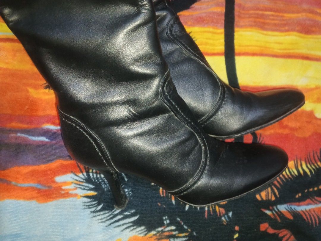 For sale!! Branded boots (Category: Boots) located in Bacnotan. Submitted by pureowl.b885c5 (Listing ID 1459702282, Image 3). Description: Barney's Newyork black leather boots 2 inch heels long zipper on the side below knee length.